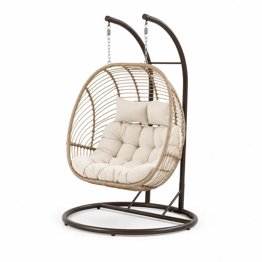 Chaise suspendue en rotin avec coussin beige et cadre en acier